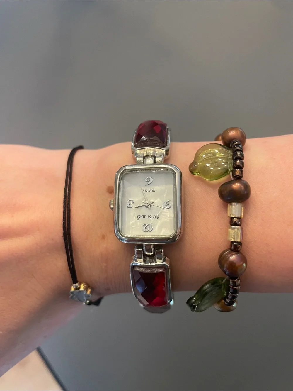 Vintage Bay Studio Silver-Tone Bracelet Watch with Red Faceted Stones